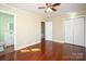 Bedroom with hardwood floors and access to the bathroom and closet at 611 Greenbriar Ave, Rock Hill, SC 29730