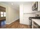 Updated kitchen with stainless steel appliances adjoins the dining area for easy serving at 611 Greenbriar Ave, Rock Hill, SC 29730