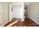 Bright laundry room featuring wood flooring, a closet and utility connections at 611 Greenbriar Ave, Rock Hill, SC 29730