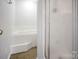 Bathroom showcasing a soaking tub and glass shower at 106 Cameron Dr, Kings Mountain, NC 28086