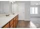 Bathroom with double sink vanity, tile flooring, and wood cabinets at 106 Cameron Dr, Kings Mountain, NC 28086