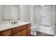 Bathroom featuring a tub and shower combo, sink with vanity and toilet at 106 Cameron Dr, Kings Mountain, NC 28086