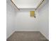 Bright, walk-in closet with neutral carpeting and wood hanging rails at 106 Cameron Dr, Kings Mountain, NC 28086