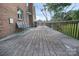 Wooden deck with furniture beside a brick exterior at 106 Cameron Dr, Kings Mountain, NC 28086