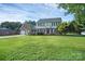 Charming brick and siding home with a well-manicured lawn and two-car garage at 106 Cameron Dr, Kings Mountain, NC 28086