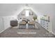 Cozy living room with a modern sectional, neutral tones, and ample space for relaxation and entertaining at 106 Cameron Dr, Kings Mountain, NC 28086