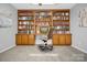 Inviting home office with built-in shelving and desk, creating a functional and organized workspace at 106 Cameron Dr, Kings Mountain, NC 28086