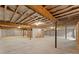 Unfinished basement with exposed ceiling beams, concrete floor, and visible framing at 6034 Jepson Ct, Charlotte, NC 28214