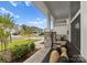 Inviting front porch with stone pillars, bench seating, and well-manicured landscaping at 6034 Jepson Ct, Charlotte, NC 28214
