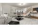 Open-concept living room with hardwood floors and staircase views at 6034 Jepson Ct, Charlotte, NC 28214