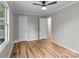 Spacious bedroom with ceiling fan, neutral walls, and wood-look floors at 4972 Mayble St, Catawba, NC 28609
