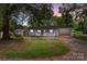 Gray house with carport and shed at dusk at 4972 Mayble St, Catawba, NC 28609