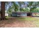 Newly renovated gray house with carport and storage shed at 4972 Mayble St, Catawba, NC 28609