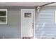 Inviting front door with a charming glass window at 4972 Mayble St, Catawba, NC 28609
