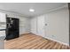 Kitchen with black appliances and white cabinets at 4972 Mayble St, Catawba, NC 28609