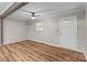Spacious living room with wood-look floors and neutral walls at 4972 Mayble St, Catawba, NC 28609