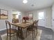 Dining room with a farmhouse table and access to kitchen at 1762 Old Carter St, Lancaster, SC 29720