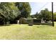 View of the back of the house with a fenced area at 1762 Old Carter St, Lancaster, SC 29720
