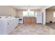 Bright kitchen with white appliances and light wood cabinets at 1762 Old Carter St, Lancaster, SC 29720