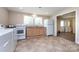 Bright kitchen with white appliances and light wood cabinets at 1762 Old Carter St, Lancaster, SC 29720