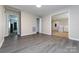 Bright living room with hardwood floors and access to other rooms at 1762 Old Carter St, Lancaster, SC 29720