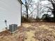 View of home's backyard, showcasing a large yard at 127 Sharon Rd, York, SC 29745
