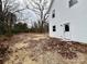 Side yard view, showing the home's exterior and landscaping potential at 127 Sharon Rd, York, SC 29745