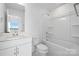 Modern bathroom featuring white cabinets, sink, toilet, and tub with shower at 459 Blairhill Rd # 02, Charlotte, NC 28217