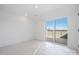 Bright bedroom with sliding glass doors to private terrace and modern finishes at 459 Blairhill Rd # 02, Charlotte, NC 28217