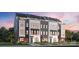 Modern townhome row features stylish, multi-story facades and professional landscaping at 459 Blairhill Rd # 02, Charlotte, NC 28217