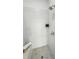 Modern shower features unique textured tile, a tiled bench and overhead shower head at 459 Blairhill Rd # 02, Charlotte, NC 28217