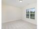 Simple bedroom with a window overlooking the backyard at 1228 Sage Pine Cir # 12, Clover, SC 29710