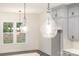 Kitchen with gray cabinets and glass pendant lights at 1228 Sage Pine Cir # 12, Clover, SC 29710