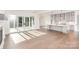 Open concept kitchen with sliding glass doors and hardwood floors at 1228 Sage Pine Cir # 12, Clover, SC 29710