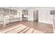 Open concept kitchen with hardwood floors and island at 1228 Sage Pine Cir # 12, Clover, SC 29710