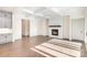 Spacious living room with hardwood floors, coffered ceilings, and a cozy fireplace at 1228 Sage Pine Cir # 12, Clover, SC 29710