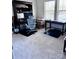 Well-lit home office with desk and rolling chair at 3524 Tully Ave, Kannapolis, NC 28081