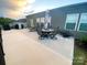 Wide patio with patio furniture and grill, perfect for outdoor living at 3524 Tully Ave, Kannapolis, NC 28081