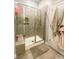 Shower with clear glass door and gray tile at 3524 Tully Ave, Kannapolis, NC 28081