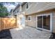 Back patio with sliding glass door access at 3178 Heathstead Pl, Charlotte, NC 28210