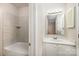 Bathroom with shower/tub combo and updated vanity at 3178 Heathstead Pl, Charlotte, NC 28210