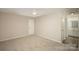 Bedroom with carpet and en-suite bathroom at 3178 Heathstead Pl, Charlotte, NC 28210