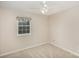 Light and airy bedroom with carpeted floor at 3178 Heathstead Pl, Charlotte, NC 28210