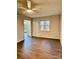 Simple bedroom with wood-look floors and access to patio at 3178 Heathstead Pl, Charlotte, NC 28210