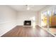 Dining area with fireplace and sliding glass doors to patio at 3178 Heathstead Pl, Charlotte, NC 28210