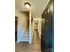 Bright entryway with staircase and view of kitchen at 3178 Heathstead Pl, Charlotte, NC 28210