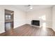 Living room with fireplace and wood-look floors at 3178 Heathstead Pl, Charlotte, NC 28210