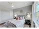 Charming bedroom with a view and neutral color palette at 3245 Mcharney Dr # 28, Harrisburg, NC 28075