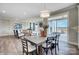 Dining area with rustic wood table and access to the back patio at 3245 Mcharney Dr # 28, Harrisburg, NC 28075