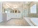 Bathroom boasts double vanity, soaking tub and walk-in shower at 3221 Mcharney Dr # 31, Harrisburg, NC 28075